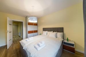 Posteľ alebo postele v izbe v ubytovaní Apartament Rakowicka 14 Deluxe Old Town WAWELOFTS