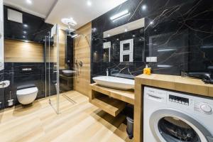 Kúpeľňa v ubytovaní Apartament Rakowicka 14 Deluxe Old Town WAWELOFTS