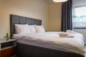 Posteľ alebo postele v izbe v ubytovaní Apartament Rakowicka 14 Deluxe Old Town WAWELOFTS