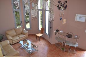 a living room with a couch and a table at Agyra Studios in Vasilika