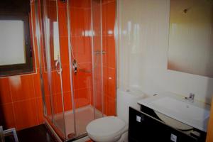 Kylpyhuone majoituspaikassa Apartamentos La Fragata