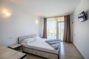 Postel nebo postele na pokoji v ubytování Sea View Vama Veche - adults only