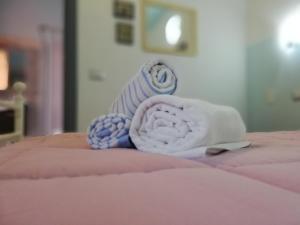 A bed or beds in a room at B&B Is Janas E5391