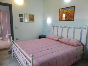 A bed or beds in a room at B&B Is Janas E5391