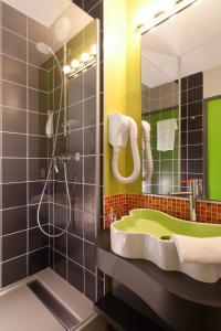 Koupelna v ubytování Ibis Styles Lyon Villeurbanne Parc de la Tête d'Or