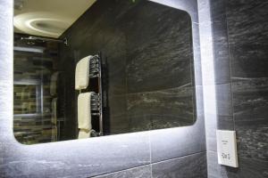 Ein Badezimmer in der Unterkunft Craigmhor Lodge & Courtyard