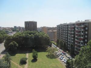 an aerial view of a city with a park and buildings at Station Home in Sesto San Giovanni
