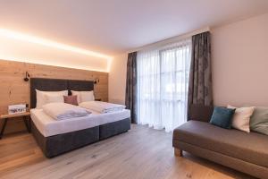 Łóżko lub łóżka w pokoju w obiekcie RESL Resort