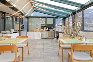 Kuchyň nebo kuchyňský kout v ubytování Martigny Boutique-Hôtel