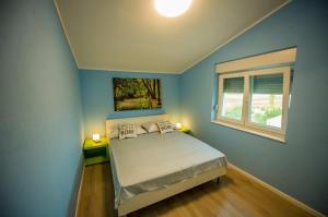 Posteľ alebo postele v izbe v ubytovaní Luxury villa Vitam in Imotski, private pool + 20 fotografií