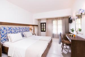 Ένα ή περισσότερα κρεβάτια σε δωμάτιο στο Simantro Resort