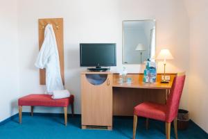 TV a/nebo společenská místnost v ubytování Aparthotel Kachelot