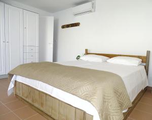 Posteľ alebo postele v izbe v ubytovaní Beach View Matala