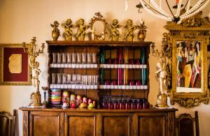 a wooden book shelf with a lot of books at BBC Christian Bed & Breakfast in Pisa