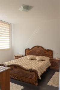 Ліжко або ліжка в номері Vila Najla