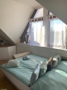 Posteľ alebo postele v izbe v ubytovaní Gem in Győr - free parking + 9 fotografií