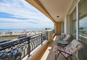 A balcony or terrace at Penelopa Palace Apart Hotel & SPA
