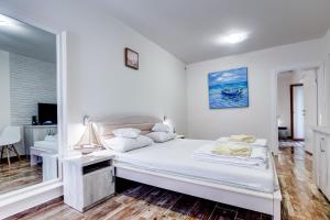 Postel nebo postele na pokoji v ubytování Hotel Sara