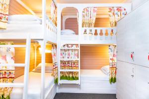 a room with bunk beds in a house at Hostel na Nevskom Mishanya in Saint Petersburg