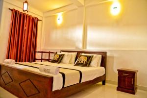 Postel nebo postele na pokoji v ubytování Ranweli Resort Anuradhapura + 21 fotografií