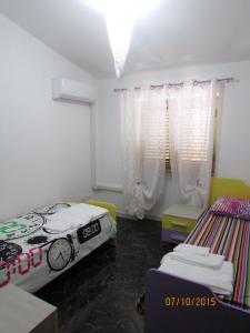 Afbeelding uit fotogalerij van Ostello Bella Calabria in Torre Ritani