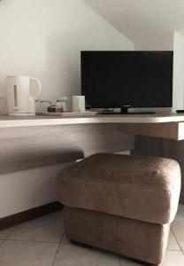 TV a/nebo společenská místnost v ubytování B&B "al Pesce Vela"