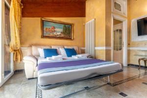 Voodi või voodid majutusasutuse Casa da Suite Maestosa toas