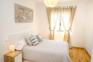 Postel nebo postele na pokoji v ubytování Apartamento L&G Centro