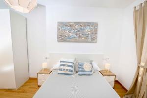 Postel nebo postele na pokoji v ubytování Apartamento L&G Centro