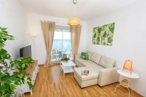 TV a/nebo společenská místnost v ubytování Apartamento L&G Centro