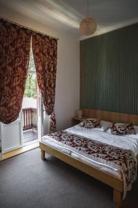 Posteľ alebo postele v izbe v ubytovaní Hotel Mezní Louka
