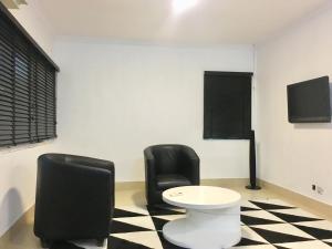TV a/nebo společenská místnost v ubytování Sese Cottage