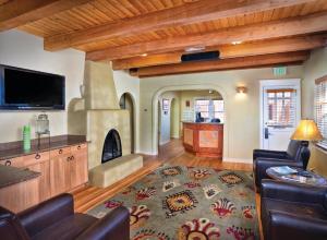 a living room with a couch and a fireplace at WorldMark Santa Fe in Santa Fe