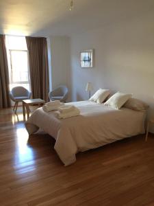 Cama o camas de una habitación en LUMINOSO Apartamento en el Centro de Cambados