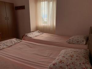 Postel nebo postele na pokoji v ubytování Temo's Guesthouse