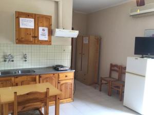 Kuchyň nebo kuchyňský kout v ubytování Hotel Kallithea
