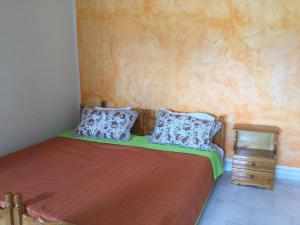 Postel nebo postele na pokoji v ubytování Hotel Kallithea
