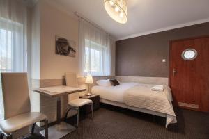 Posteľ alebo postele v izbe v ubytovaní Villa 33 Blisko Plaży