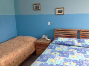 Postel nebo postele na pokoji v ubytování Hotel Arena Coco Playa