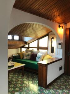Cama ou camas em um quarto em La Soffitta Bohemien