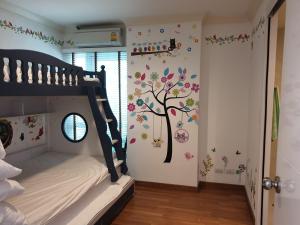 Postel nebo postele na pokoji v ubytování My Resort Huahin C605