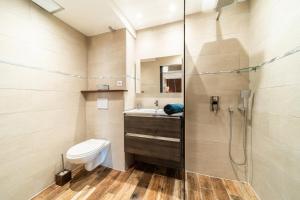 Bagno di T2 classé 4 étoiles avec jardin, piscine, vue mer à Saint-Gilles-les-Bains