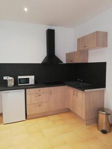 Kuchyň nebo kuchyňský kout v ubytování Au Sabluline chambres d'hôtes gîtes