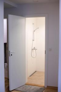 Koupelna v ubytování Kvartal Delux, parking, Tartu Home