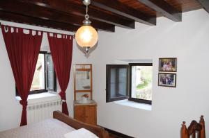A bed or beds in a room at La Casona de los Nonos