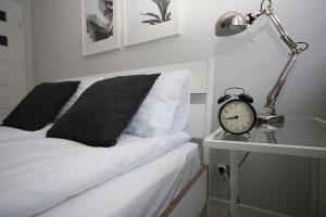 Posteľ alebo postele v izbe v ubytovaní APARTAMENT SŁOBÓDZKIEGO 7