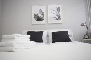 Posteľ alebo postele v izbe v ubytovaní APARTAMENT SŁOBÓDZKIEGO 7