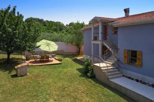 Сад в Villa Giardina Apartments
