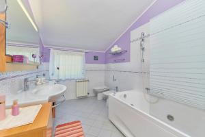 Ванная комната в Villa Giardina Apartments