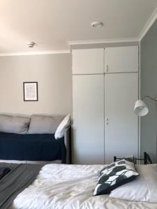 Säng eller sängar i ett rum på Lindens Bed&Breakfast